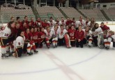 The Midget Elite Calgary Fire White & Red teams pose for a photo following their battle at Wickfest.